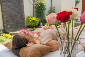 Relaxed woman doing healing with roses